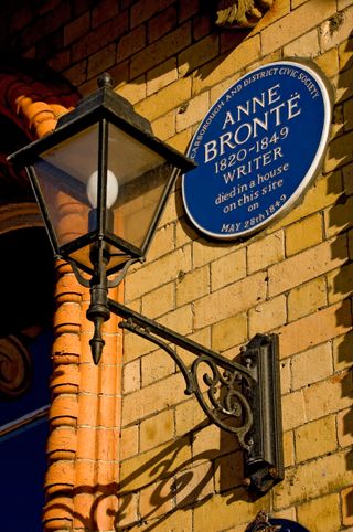 Plaque to writer Anne Bronte on wall of The Grand Hotel Scarborough North Yorkshire England UK United Kingdom GB Great Britain. Image shot 2009. Exact date unknown.