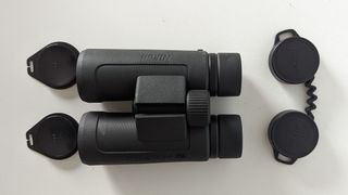 The lens caps and accessories and Nikon Prostaff P3 8x42 binocular