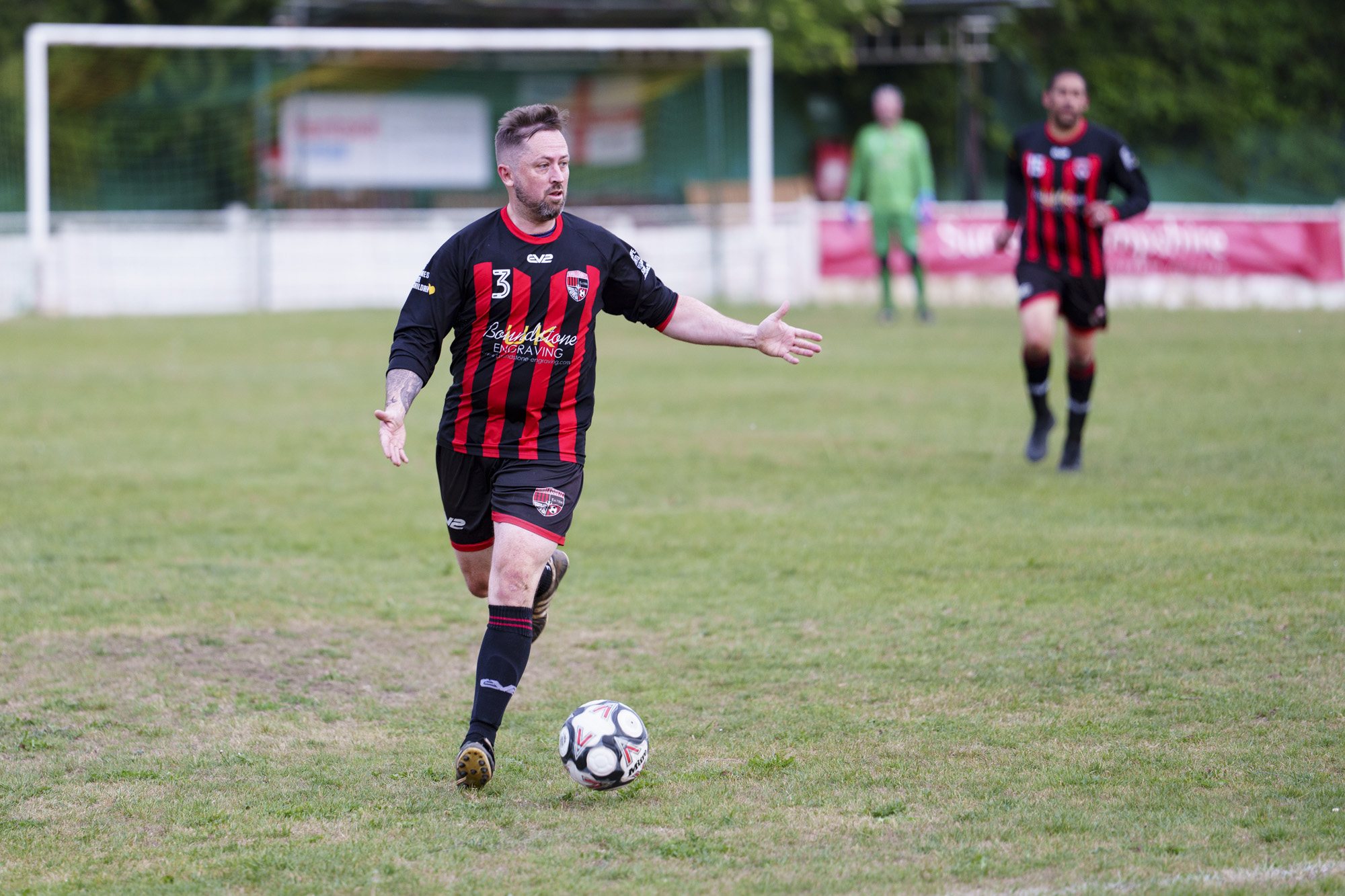 Soccer players in action, taken with the Sony FE 50-150mm F2 GM lens