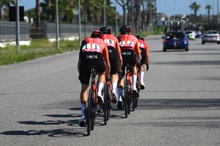 Ineos Grenadiers guiding Geraint Thomas after his crash on stage 9 of the Giro d'Italia