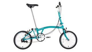 a Brompton B75 in green colour against a white background