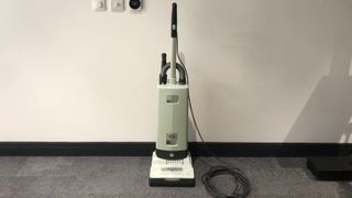 The SEBO vacuum, assembled, upright in our test studio