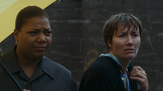 Queen Latifah and Emma Thompson in the rain in Stranger Than Fiction