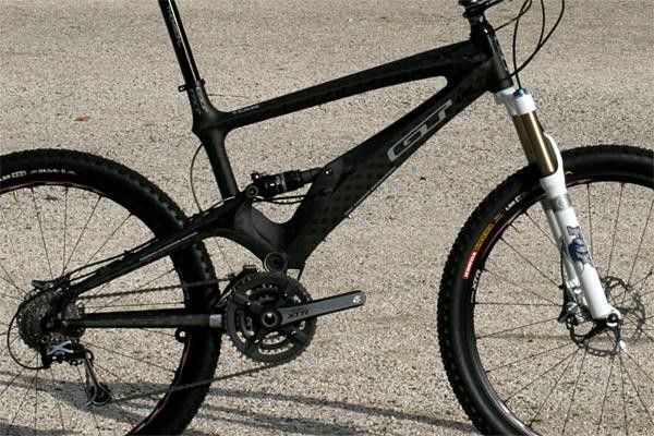 The GT Marathon Team features a subtle bare carbon finish.