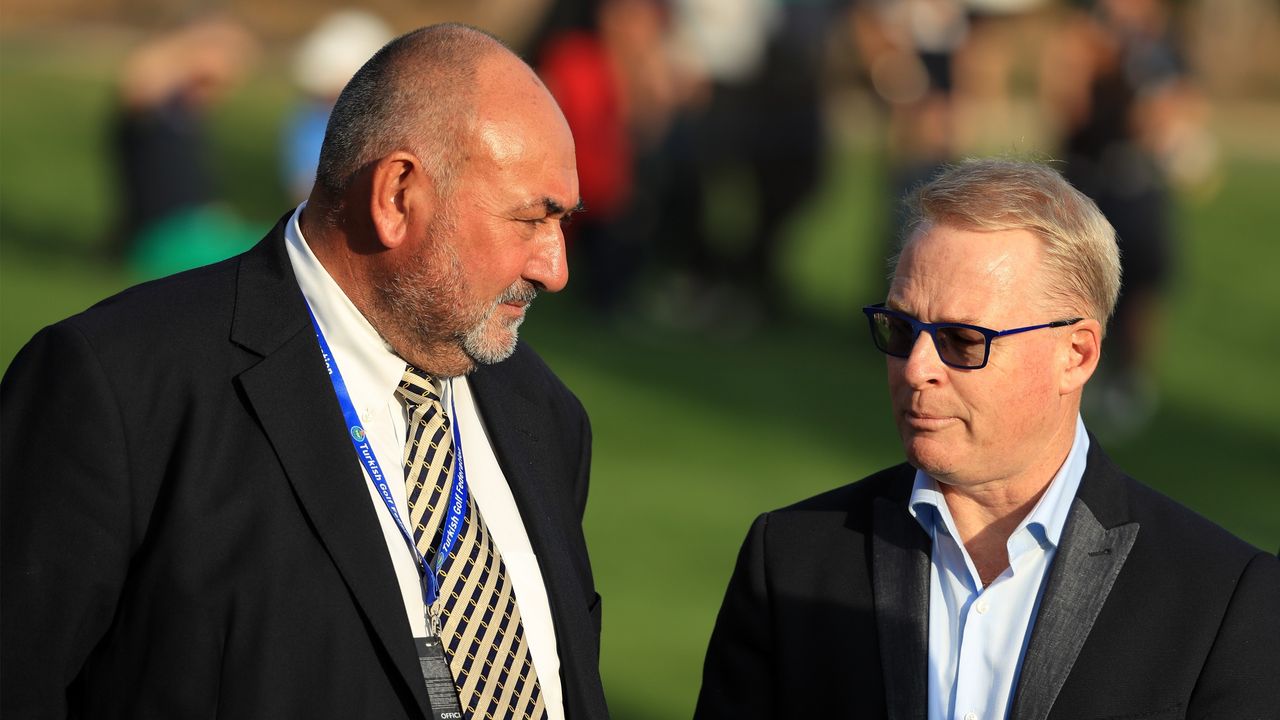 European Tour Chief Executive Keith Pelley speaks to Andrew&#039;Chubby&#039; Chandler (L) at the trophy presentation during day four of the Turkish Airlines Open at the Regnum Carya Golf &amp; Spa Resor