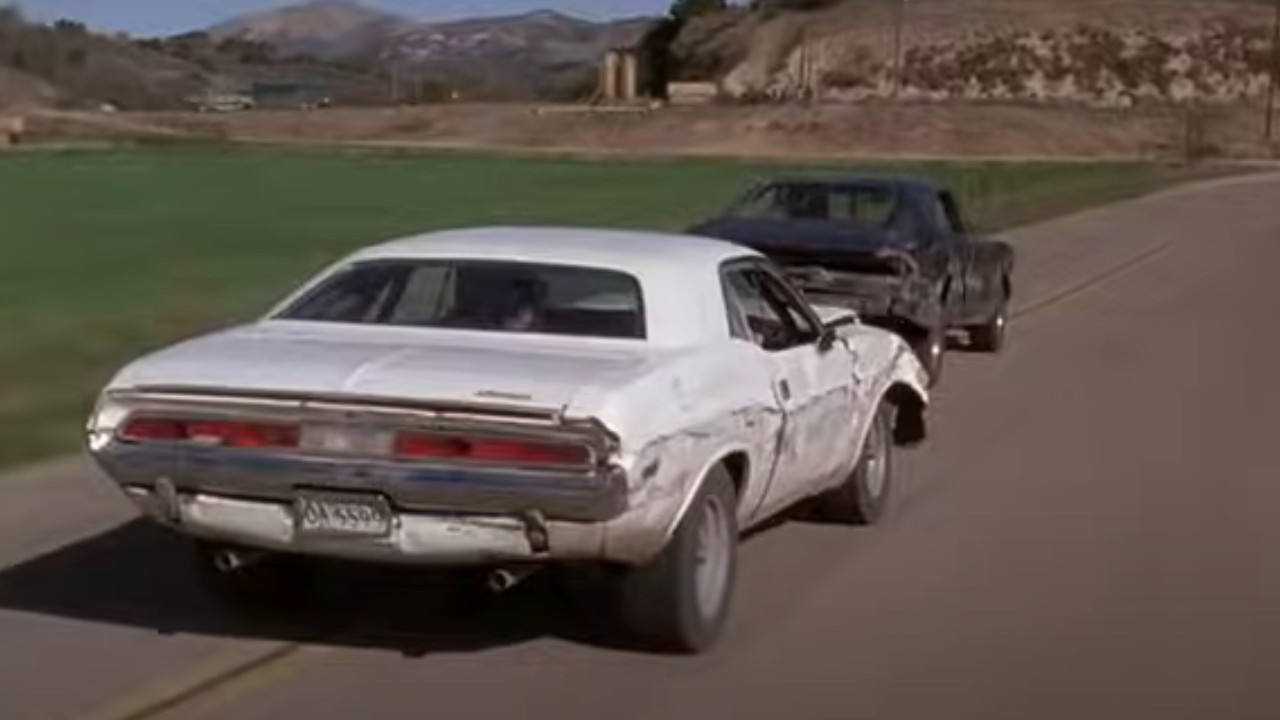 Two cars in an exciting chase in Death Proof
