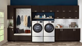 LG WM4000HWA washing and the LG DLEX4000W clothes dryer stacked on pedestals
