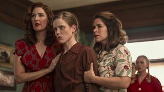 Greta and Carson hold Jess back in a stand-off in A League of Their Own on Prime Video