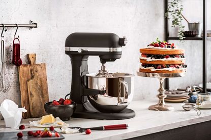 KitchenAid Professional stand mixer next to a cake