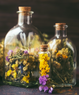 Pressed flowers in a glass jar