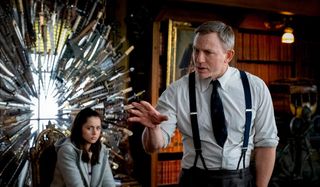 Daniel Craig explains the solution in front of Ana de Armas in Knives Out.