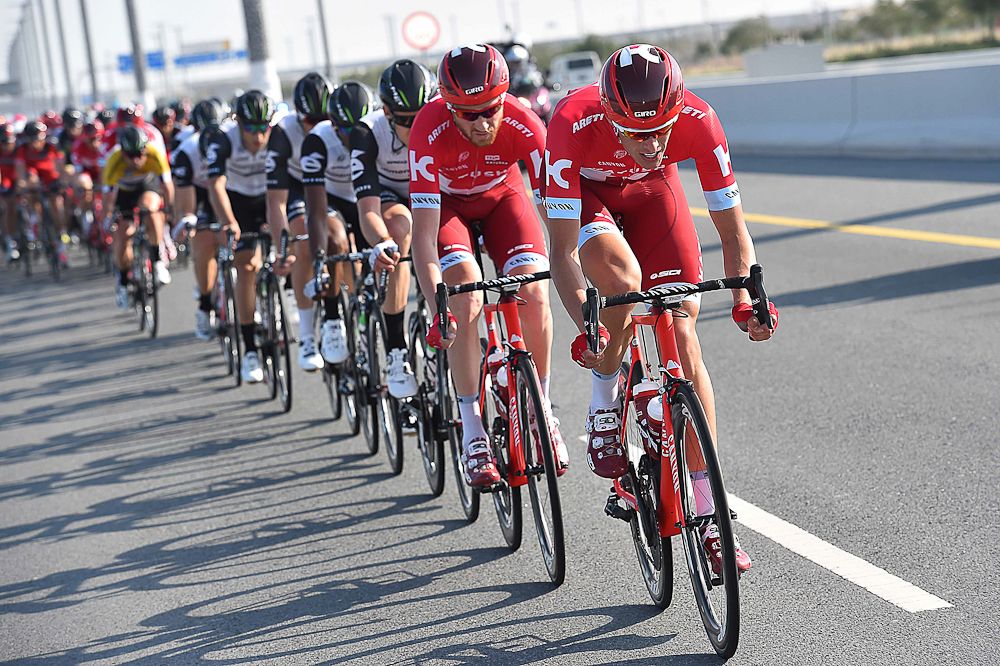 Katusha's Nils Politt and Dmitriy Kozonchuk lead the peloton near Sealine Beach Resort