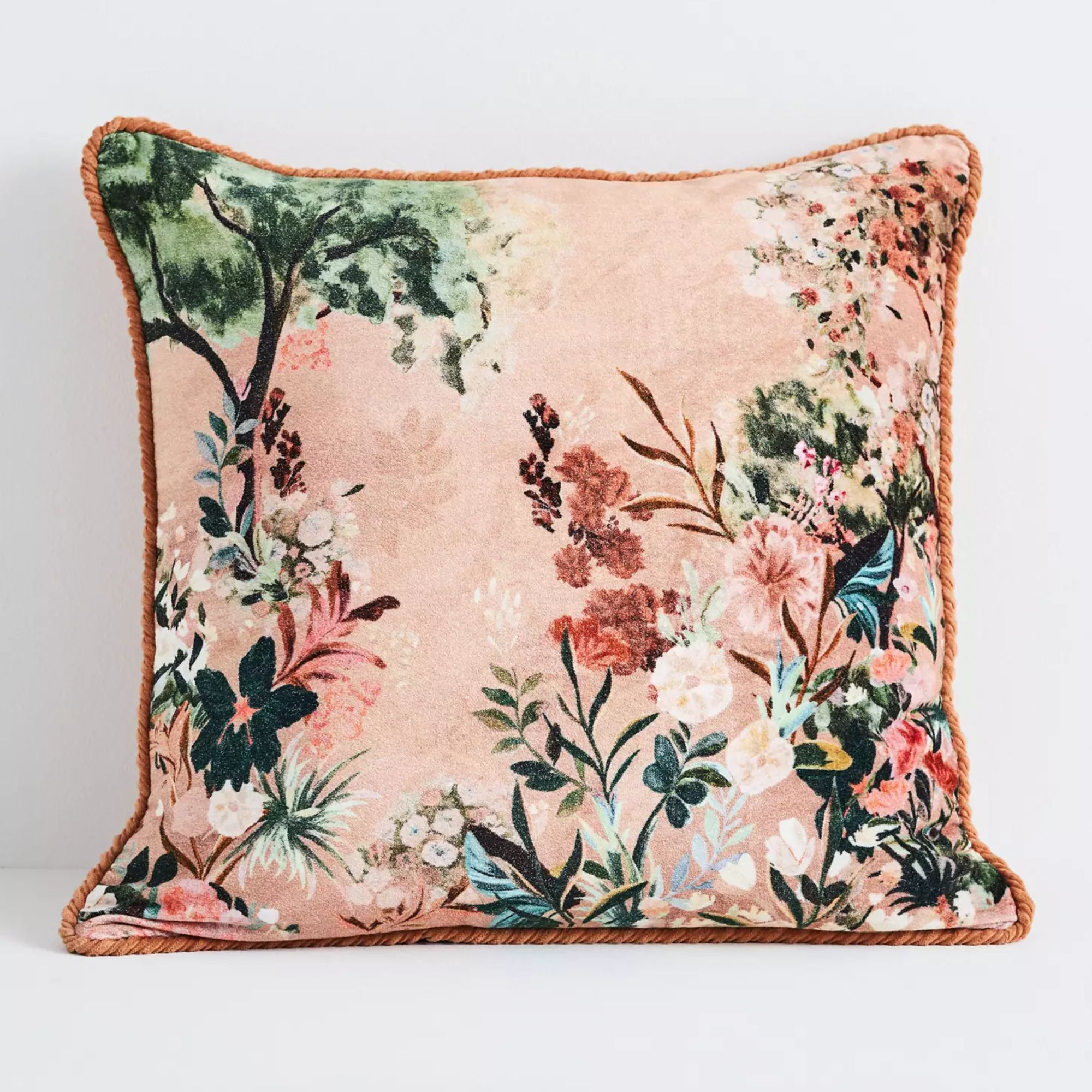 Pink floral velvet pillow with coral trim
