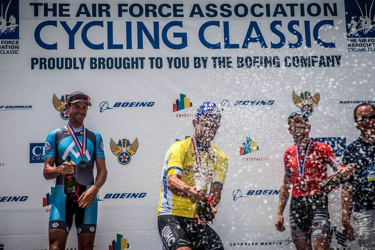 Hilton Clarke (UnitedHealthcare) launches some champagne after taking the omnium jersey