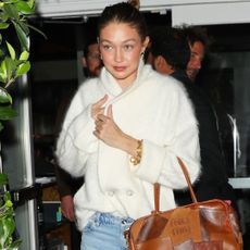 Gigi Hadid joined Bradley Cooper on a cozy date night instead of attending the 2026 golden globes