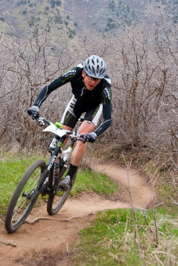 Racing on buff singletrack at Utah Championship Series race 1 in Lambert Park, Utah
