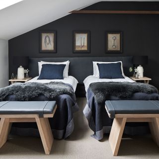 bedroom with grey wall and twin beds