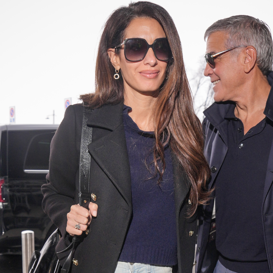 Amal Clooney was spotted at the Milan airport in the baggy, straight-leg jeans trend