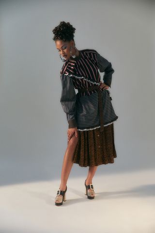 Model wears stripe Diotima dress