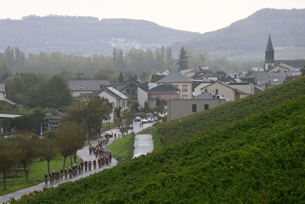 MAMER LUXEMBOURG SEPTEMBER 21 A general view of the peloton passing through a vineyards landscape during the 83rd Skoda Tour Luxembourg 2023 Stage 2 a 1839km stage from MondorflesBains to Mamer UCIWT on September 21 2023 in Mamer Luxembourg Photo by Tim de WaeleGetty Images