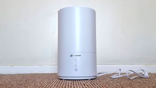 PureGuardian H950AR Ultrasonic Cool Mist Humidifier sitting on a carpet