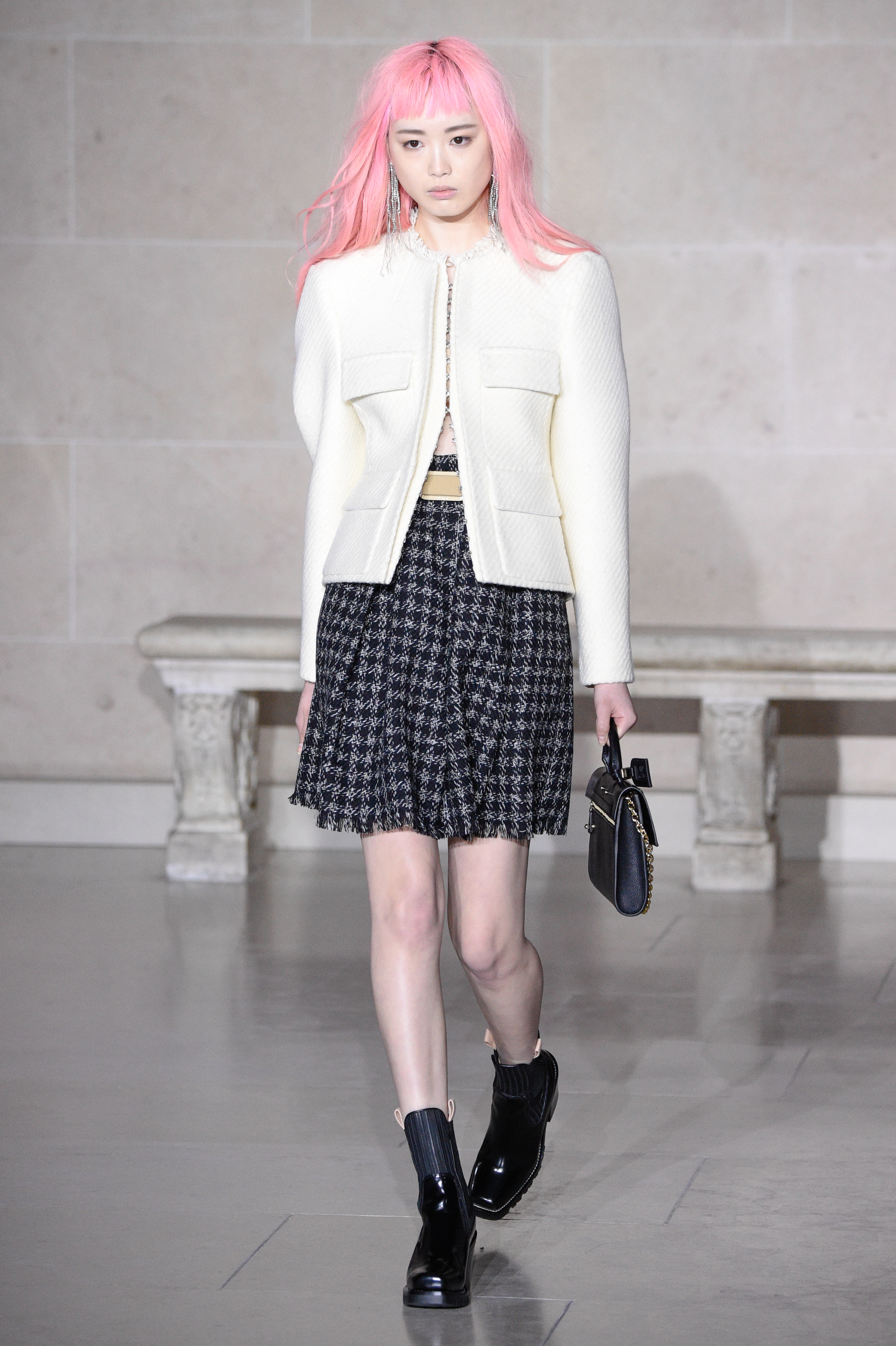 Fernanda Hin Lin Ly walks the runway during the Louis Vuitton show as part of the Paris Fashion Week Womenswear Fall/Winter 2017/2018 on March 7, 2017