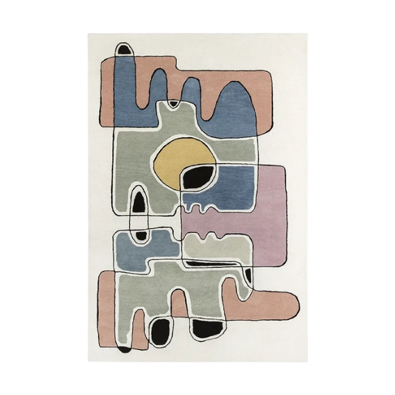 A colorful, abstract tufted rugs with a white background and green, terracotta, pink, blue, and yellow, as well as black shapes.
