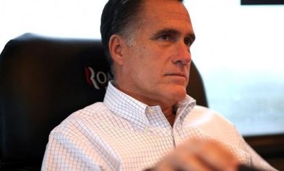 Mitt Romney sits on his campaign bus on Oct. 29 en route to a rally in Avon Lake, Ohio