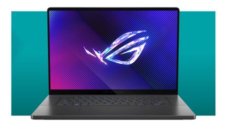 The Asus ROG Zephyrus G16 on a teal deals background with the Asus logo displayed on screen.