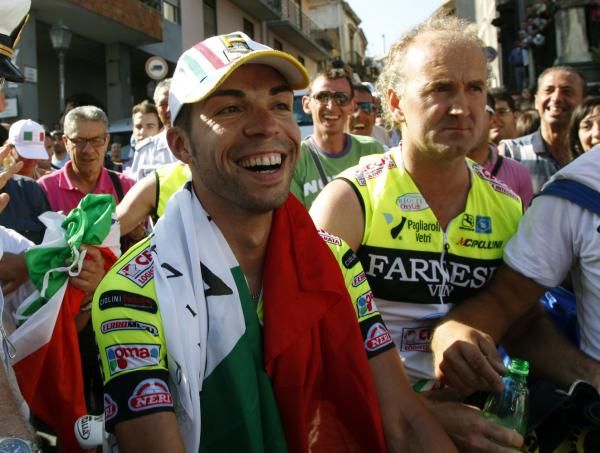 Visconti wears an Italian flag and a big smile
