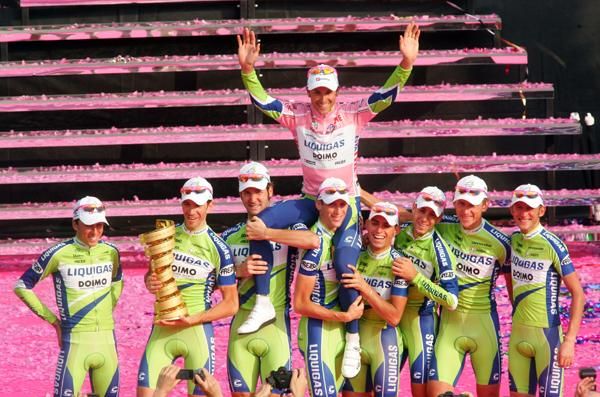 Basso holds his hands up and thanks his team