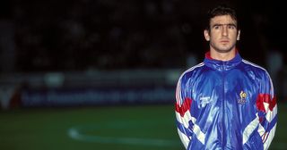 Eric Cantona lines up ahead of a fixture for the French national team in the 1990s