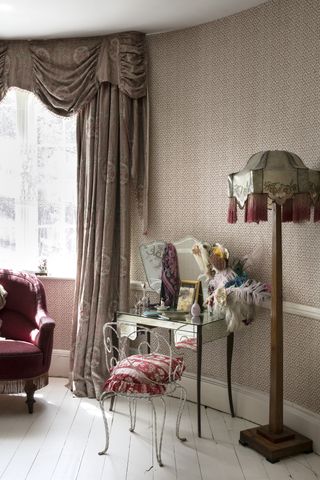 bedroom curtain ideas with a valance and long printed curtain