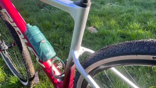 Close up of bike frame and water bottle