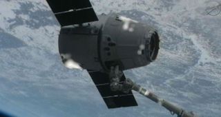 SpaceX Dragon falls under the International Space Station's shadow on March 3, 2013.