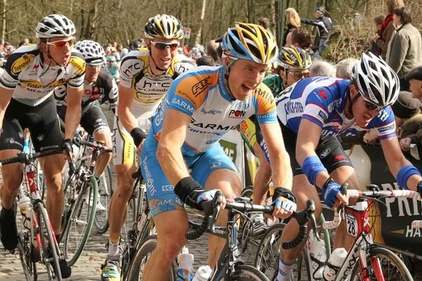 Tylar Farrar rides next to Wouter Weylandt.