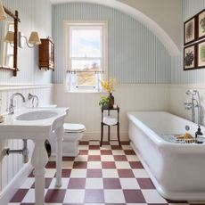 bathroom area with white bath tub and wash basin