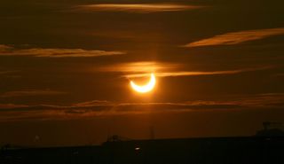Skywatcher Dennis Put of Maasvlakte in The Netherlands took this amazing sunrise solar eclipse photo on Jan. 4, 2011 during the first partial solar eclipse of the year.