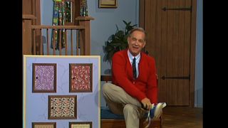 Tom Hanks, as Fred Rogers, in a stylistic recreation of Mister Rogers' Neighborhood