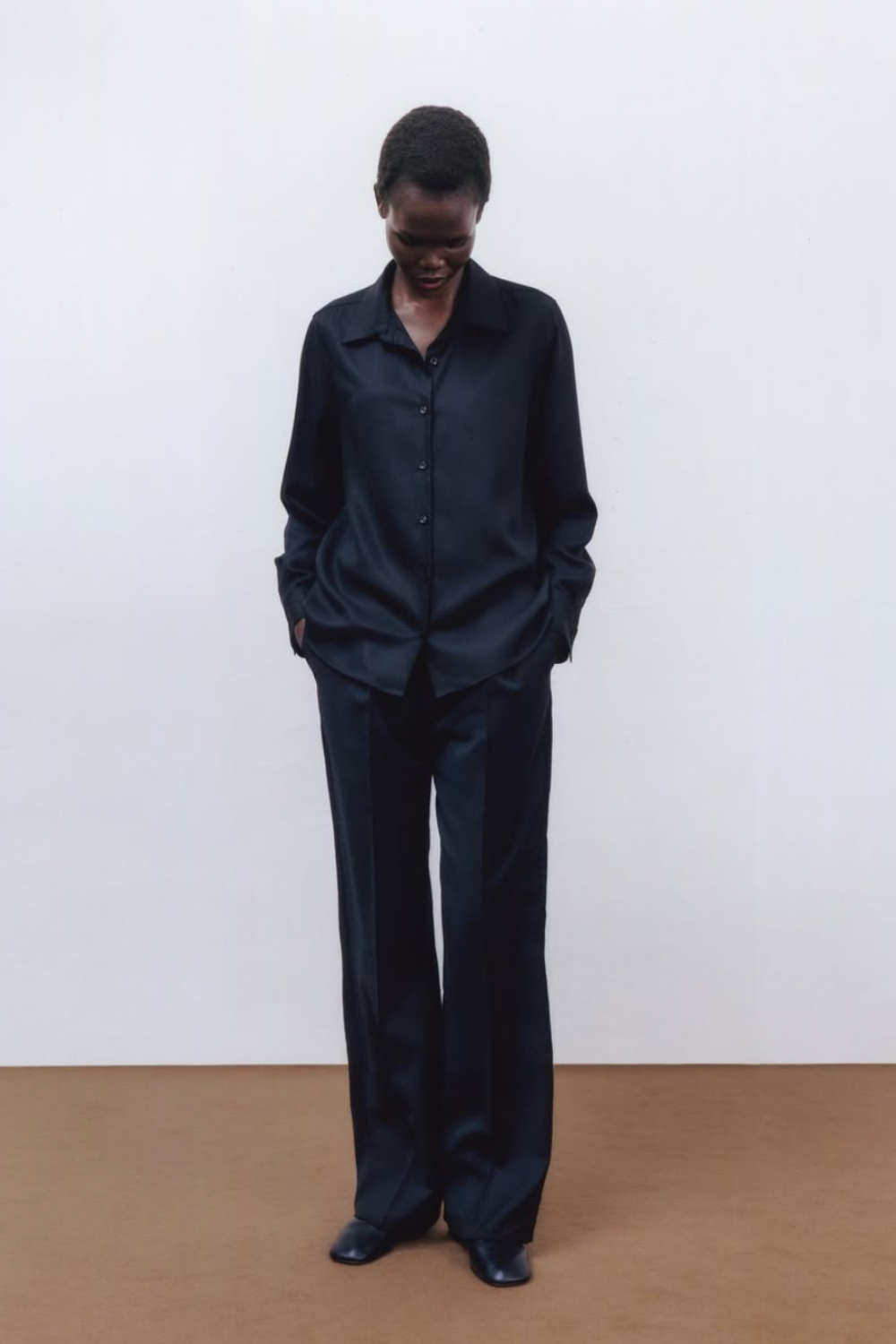 Asket black shirt black trousers