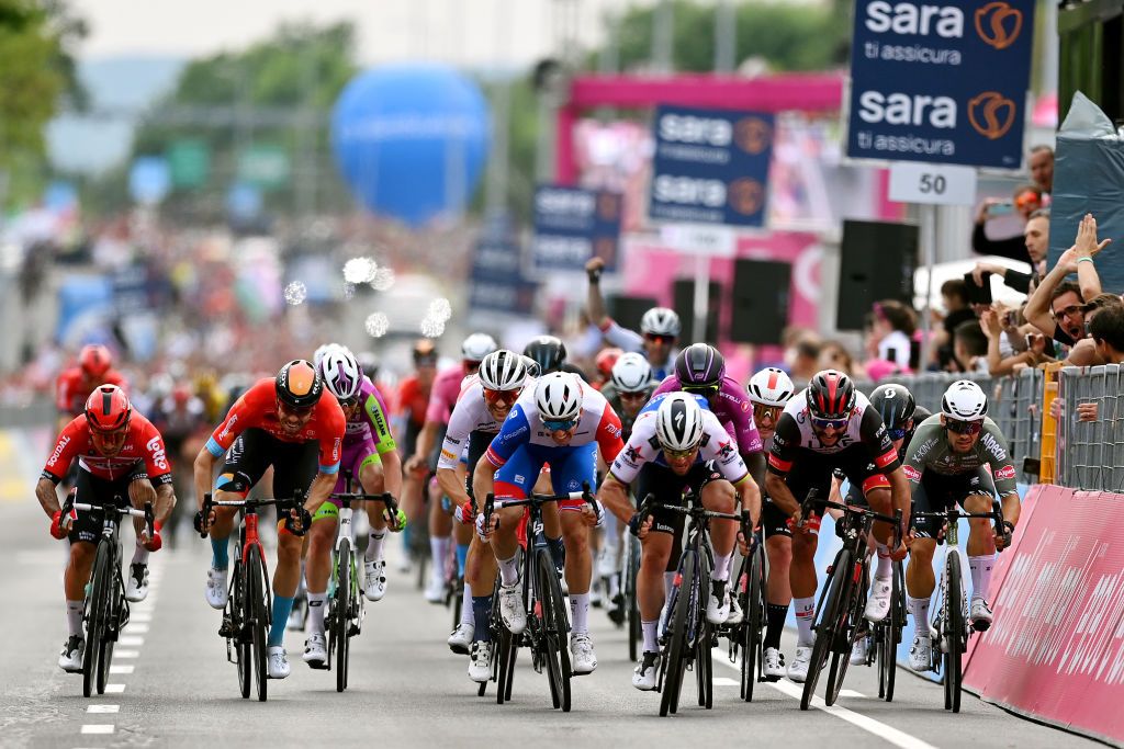BALATONFURED HUNGARY MAY 08 Mark Cavendish of United Kingdom and Team QuickStep Alpha Vinyl Caleb Ewan of Australia and Team Lotto Soudal Arnaud Demare of France and Team Groupama FDJ Hailu Biniam Girmay of Eritrea and Team Intermarch Wanty Gobert Matriaux purple points jersey Fernando Gaviria Rendon of Colombia and UAE Team Emirates and Jakub Mareczko of Italy and Team Alpecin Fenix sprint to win during the 105th Giro dItalia 2022 Stage 3 a 201km stage from Kaposvr to Balatonfred Giro WorldTour on May 08 2022 in Balatonfured Hungary Photo by Stuart FranklinGetty Images