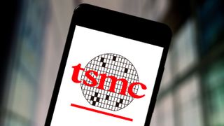The TSMC logo displayed on a smartphone
