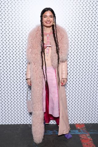 A guest attends the Marine Serre Womenswear Fall/Winter 2024-2025 show as part of Paris Fashion Week on March 04, 2024 in Paris, France.