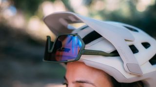 Shimano Technium sunglasses on a helmet