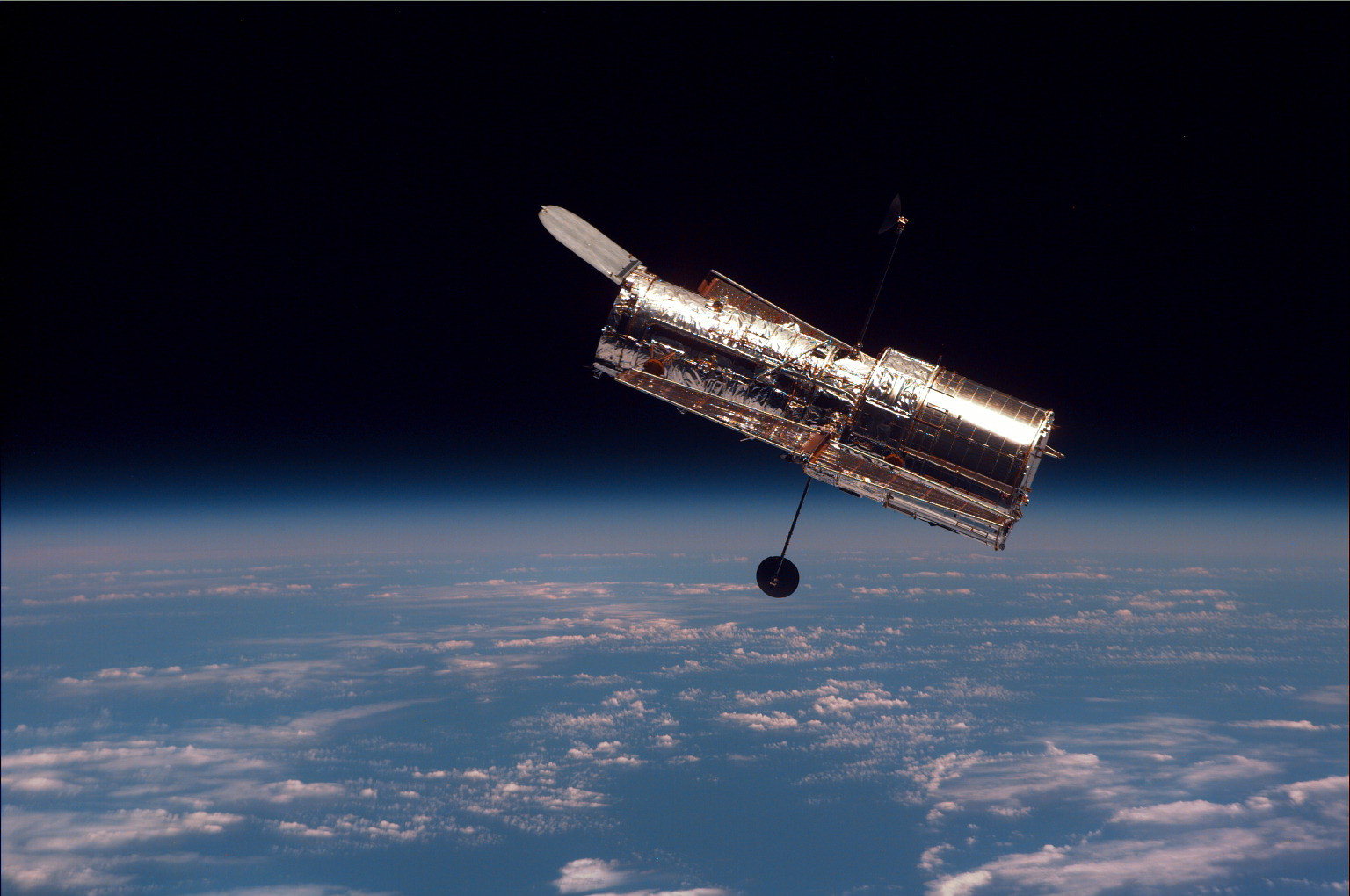 The Hubble Space Telescope seen in orbit around Earth.