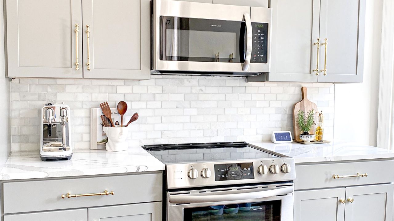 Gray kitchen with oven and microwave