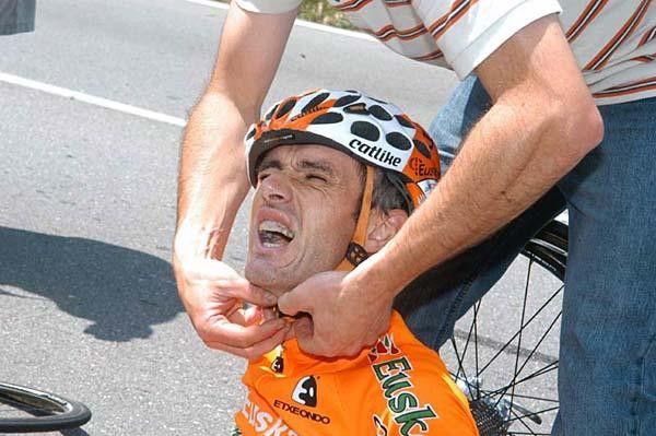 Robert Laiseka (Euskaltel) is in a great deal of pain after an early crash