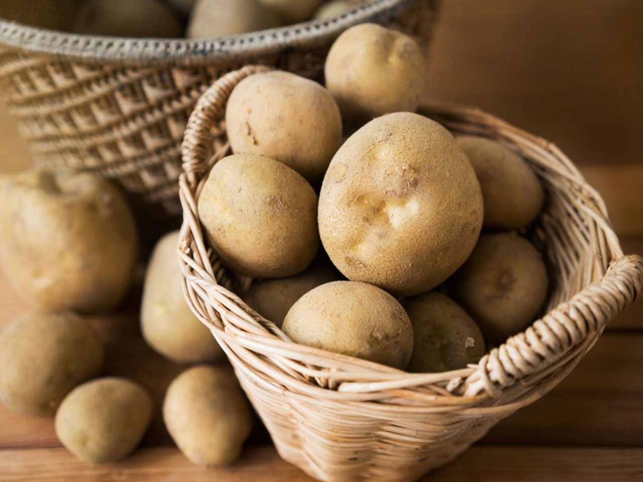 Woven Baskets Full Of Potatoes