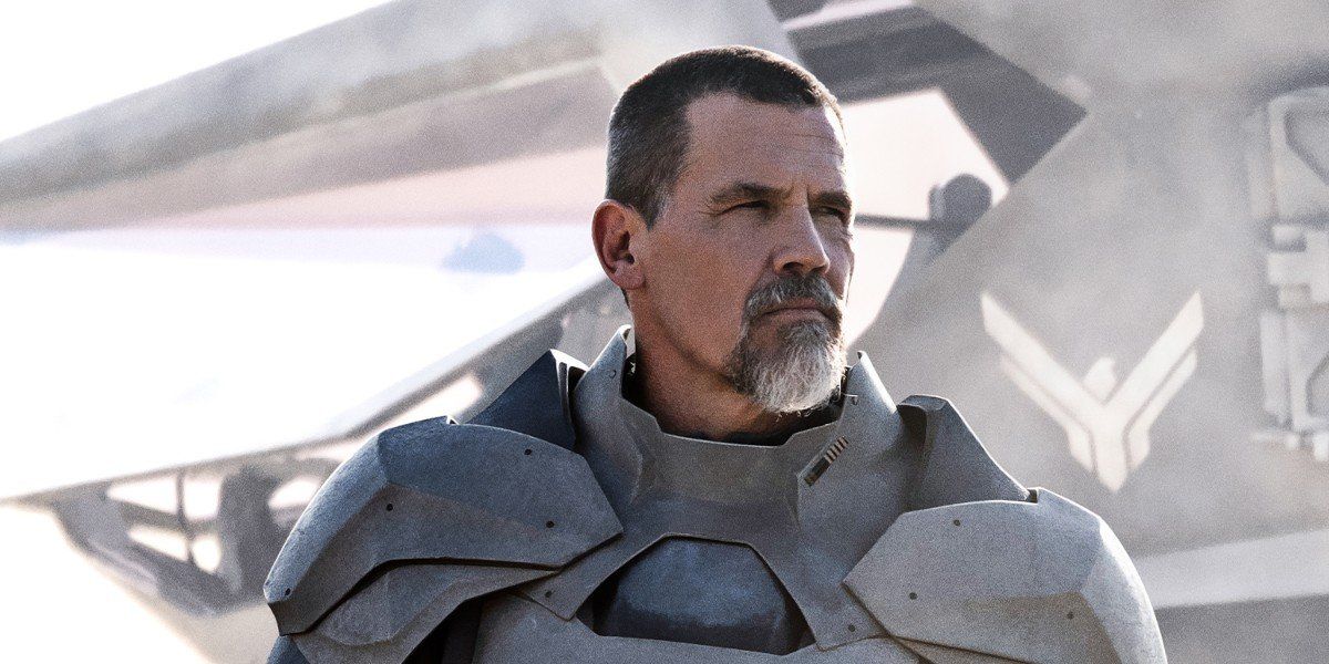 Josh Brolin as Gurney looking stoic after emerging from an airship in Dune