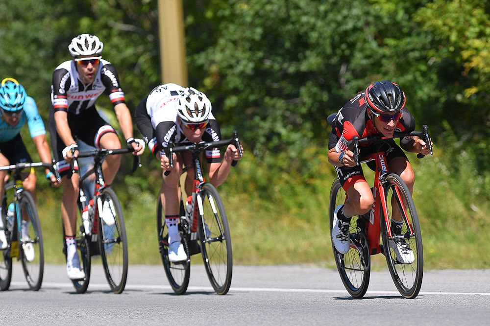 Riders tuck on a descent during GP de Montreal